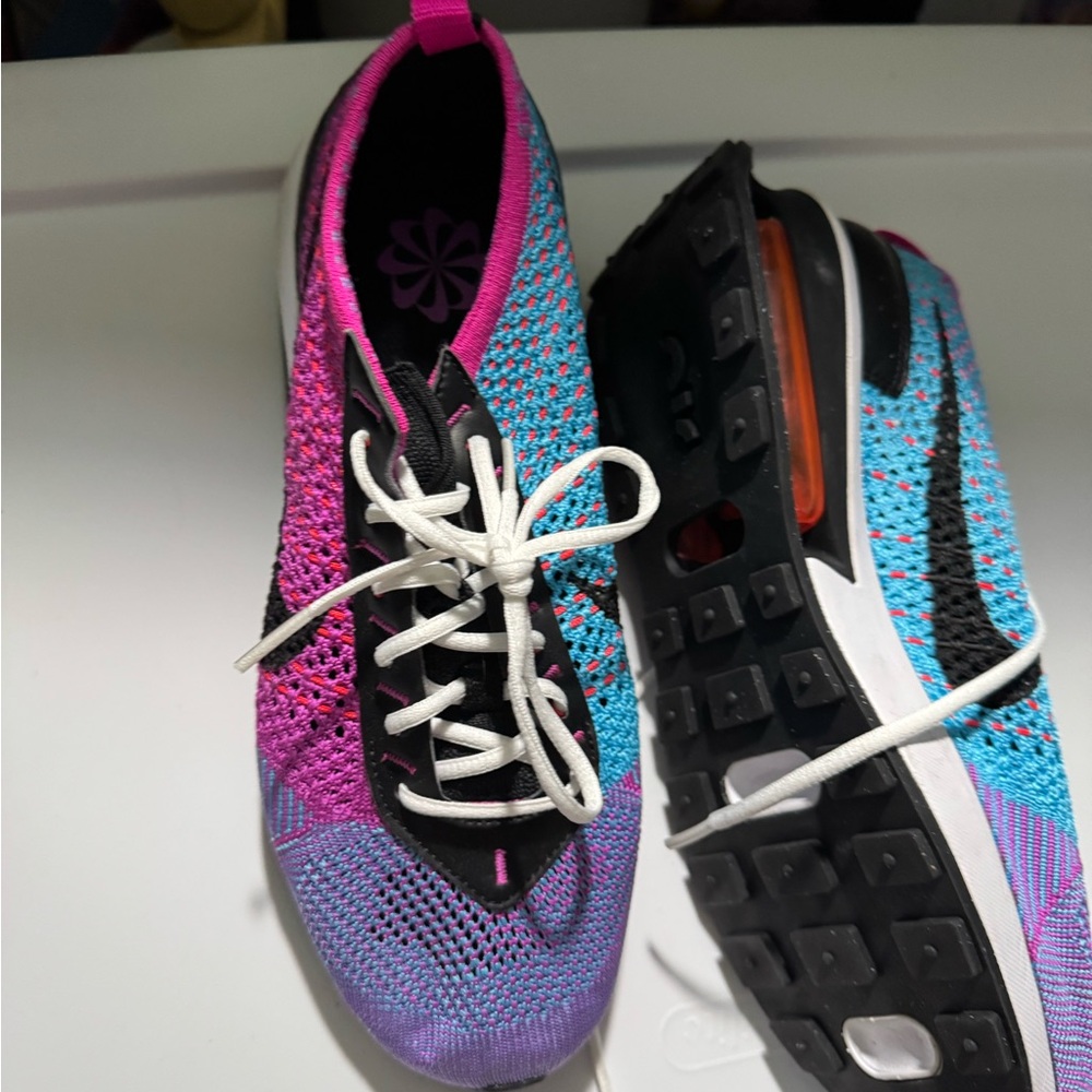 Nike Pink and Blue Athletic Shoes Gradient Knit Design
